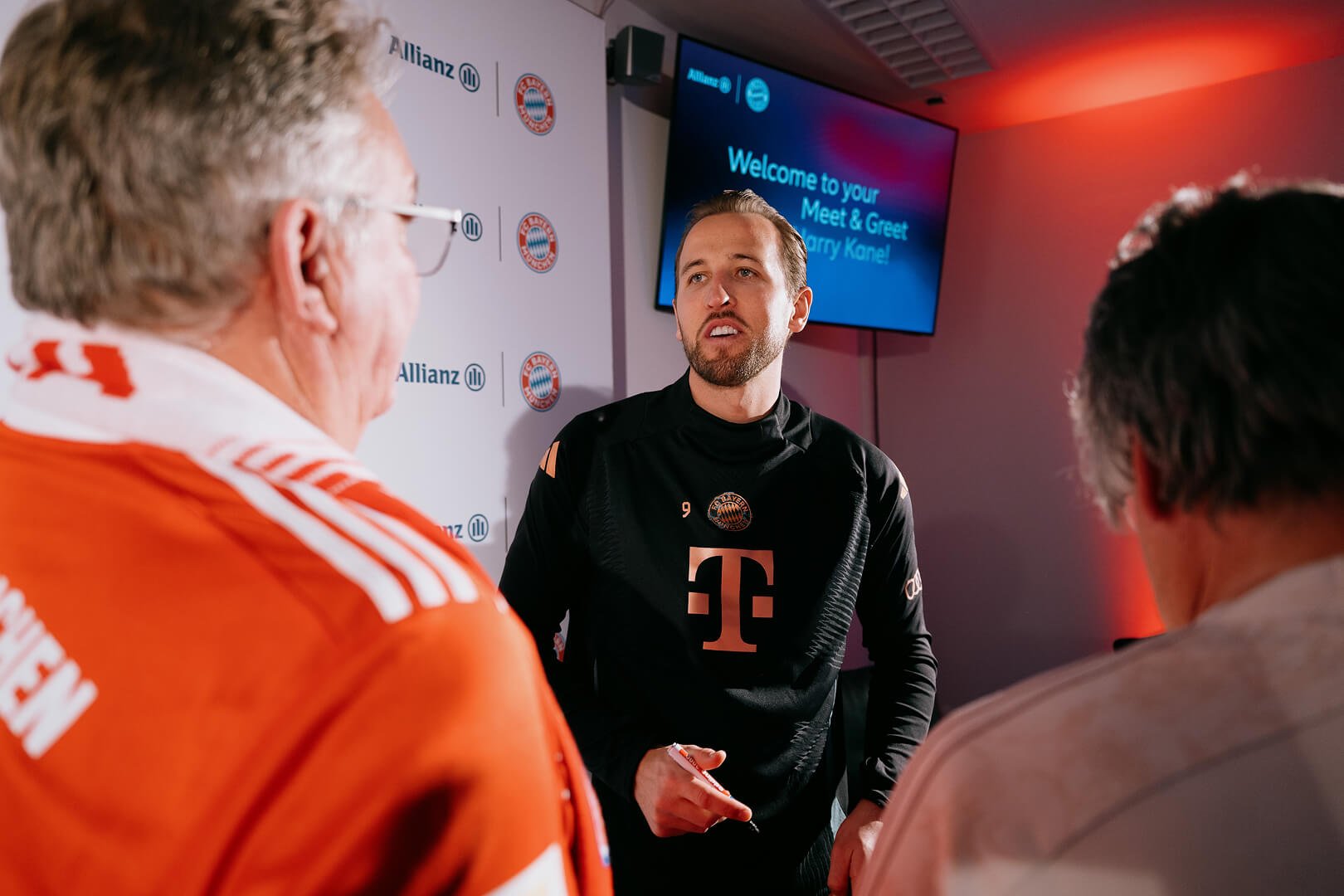 Harry Kane talking to fans at a meet and greet