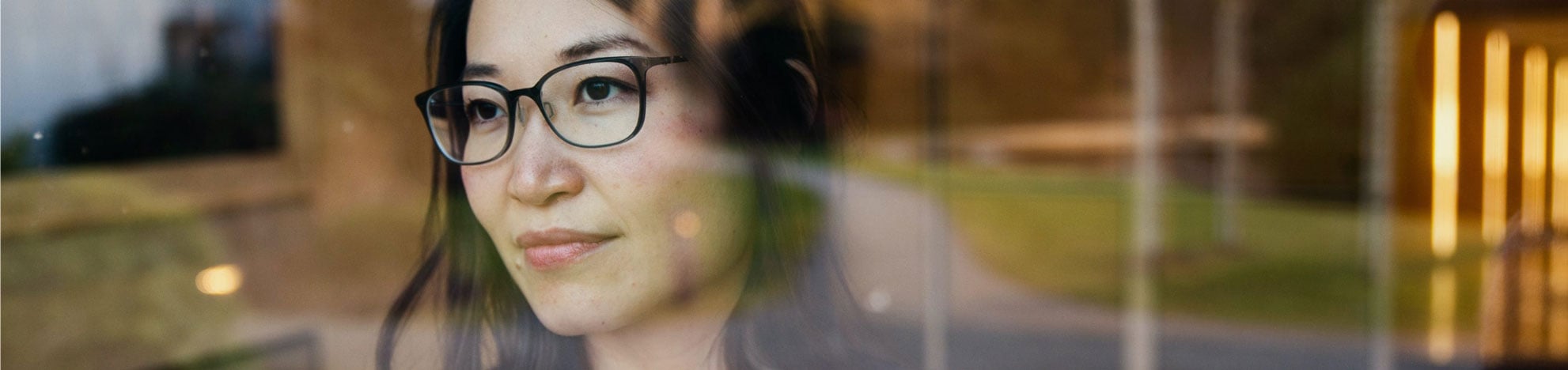 Allianz female employee looking confidently