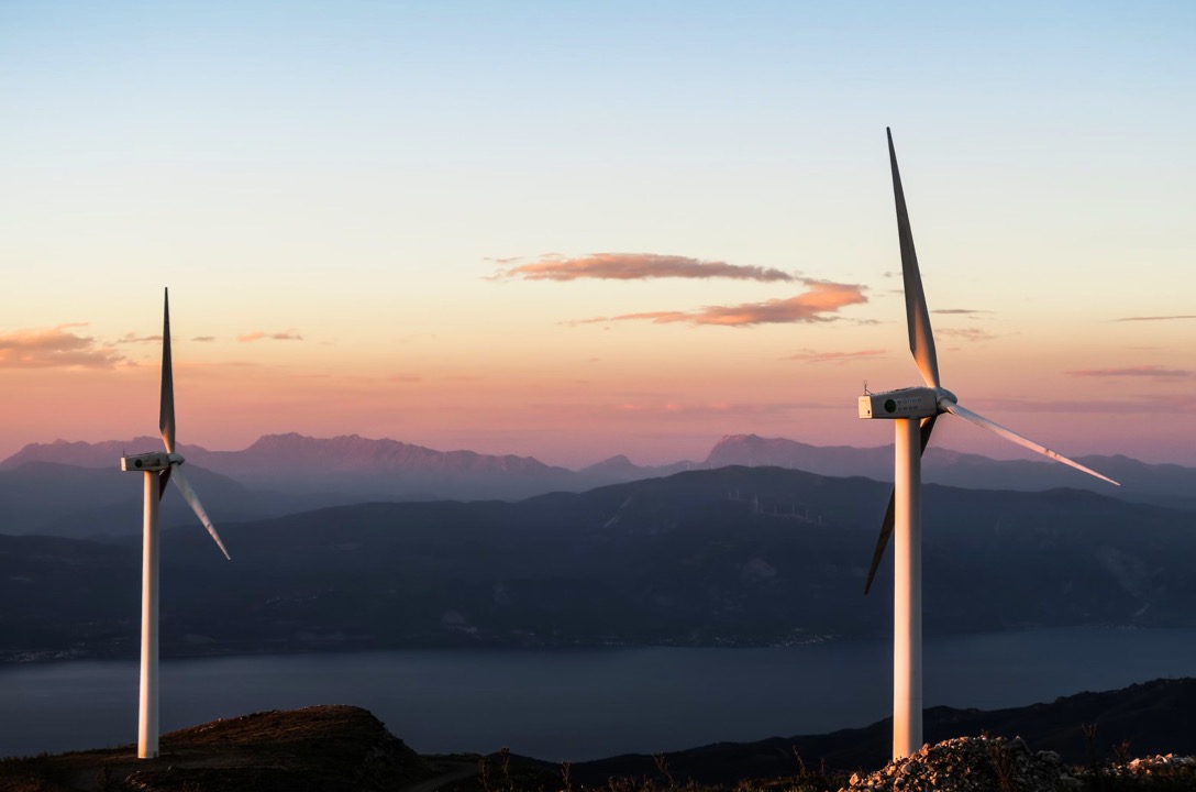 Wind turbines in idyllic alpine panorama