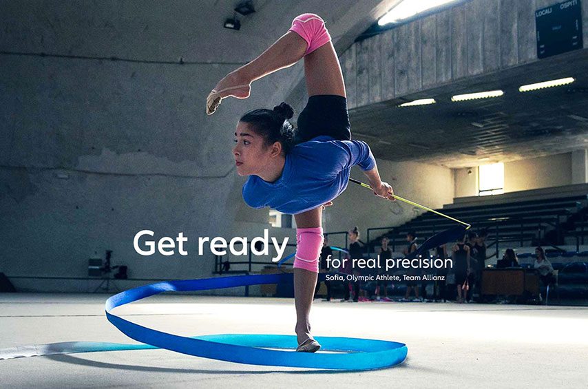 Italien rhythmic gymnast Sofia Raffaeli during a performance. Headline saying: Get ready for real precision, Sofia, Olympic Athlete, Team Allianz