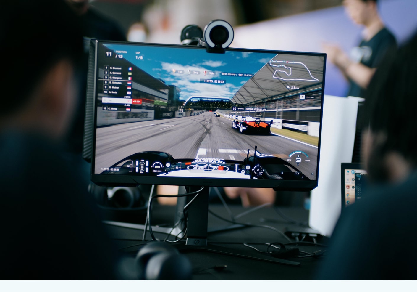 A screen showing a scene from the video game Gran Turismo.