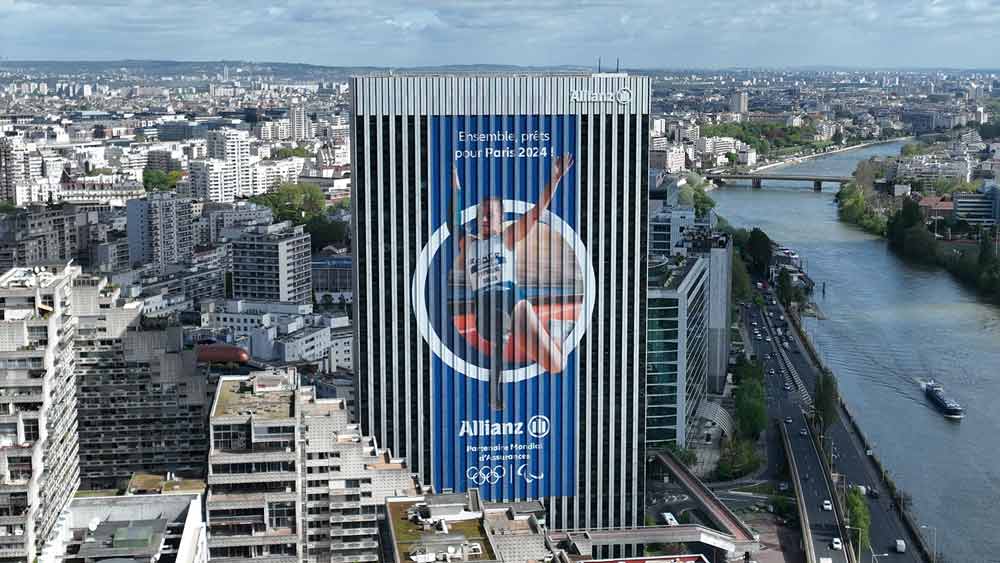 Allianz France gears up for Paris 2024 Olympic and Paralympic Games with a giant banner on Neptune Tower.