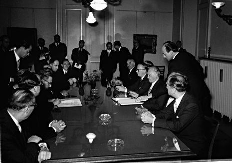 German Chancellor Konrad Adenauer and Israeli Foreign Minister Moshe Sharett signing the Luxembourg Agreement on Restitution and Compensation in 1952.  - Bundesbildstelle Berlin