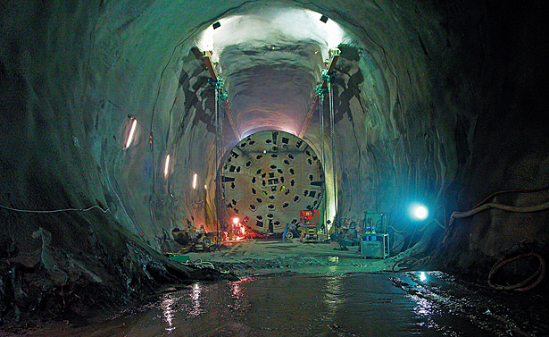 A quarter of the tunnel length was excavated with explosive charges, the rest by tunnel boring machines. 