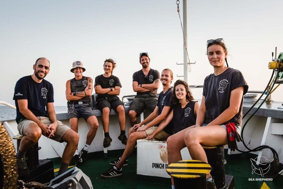 Allianz volunteers and Sea Shepherd crew members aboard the Sea Eagle.