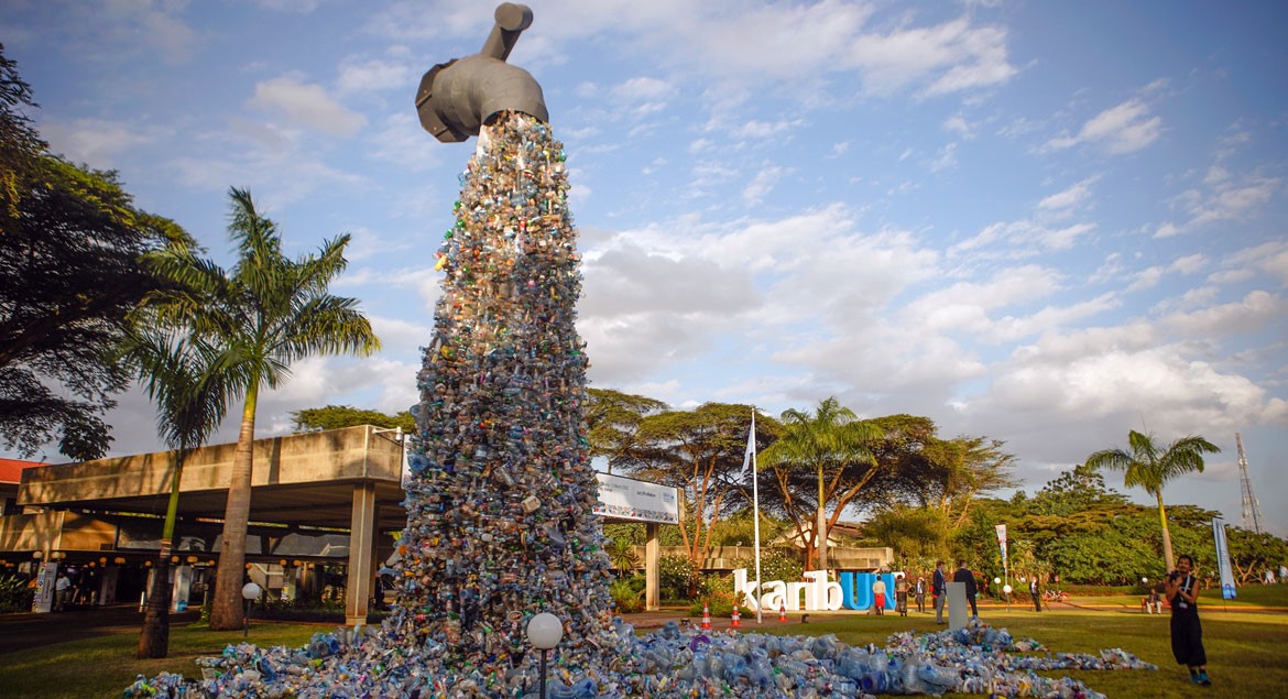 UNEP/Cyril Villemain, A 30-foot high monument entitled 'Turn off the plastics tap' by Canadian activist and artist Benjamin von Wong stands outside the venue for the UN Environment Assembly in Nairobi, Kenya.